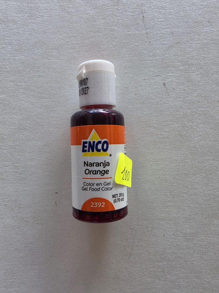 Frasco de colorante en gel color naranja, envase blanco con etiqueta
