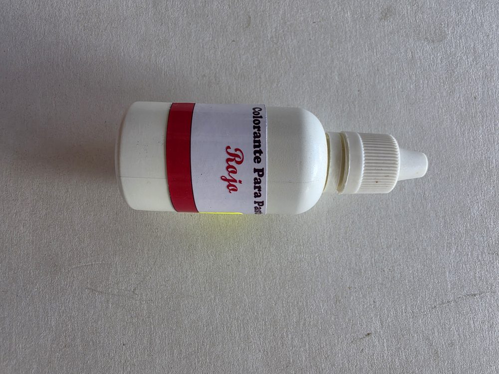 Frasco plástico blanco de colorante liquido rojo para pasteles