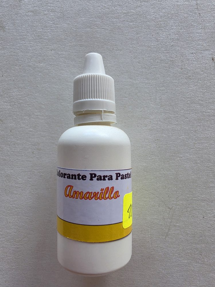 Frasco plástico blanco de colorante liquido amarillo para pasteles