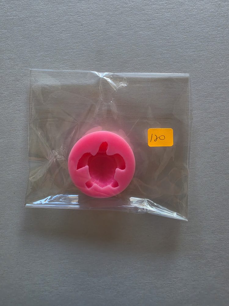 Molde de silicón rosado redondo con figura de tortuga marina